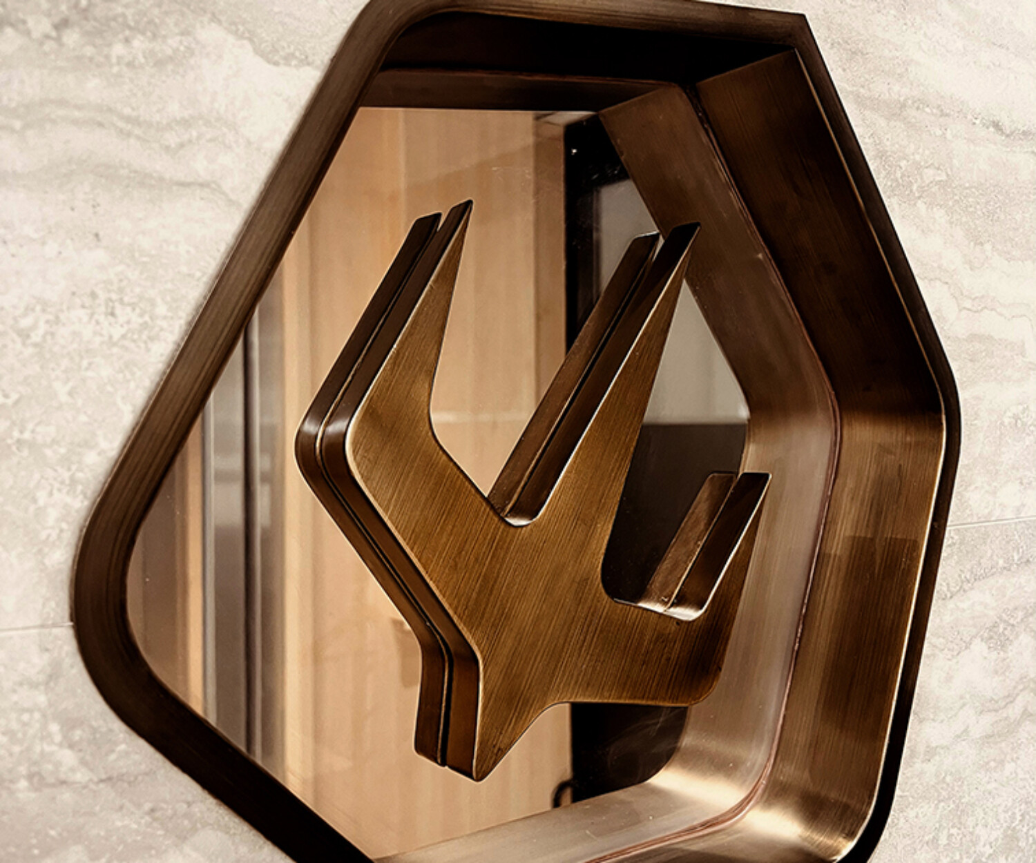 Charterama Office Renovation with tile, wood louvers and stainless steel signage