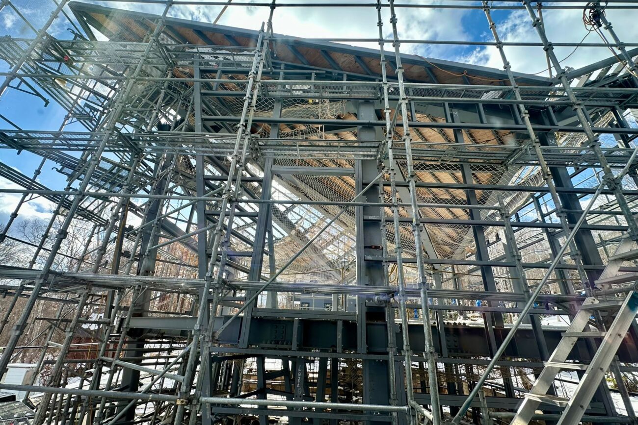 scafollding and framing of a steel frame post and beam house construction site with a triangular roof in Niseko, Kutchan Hokkaido Japan