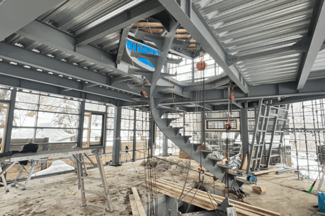 photograph of a steel frame construction of a house in niseko japan